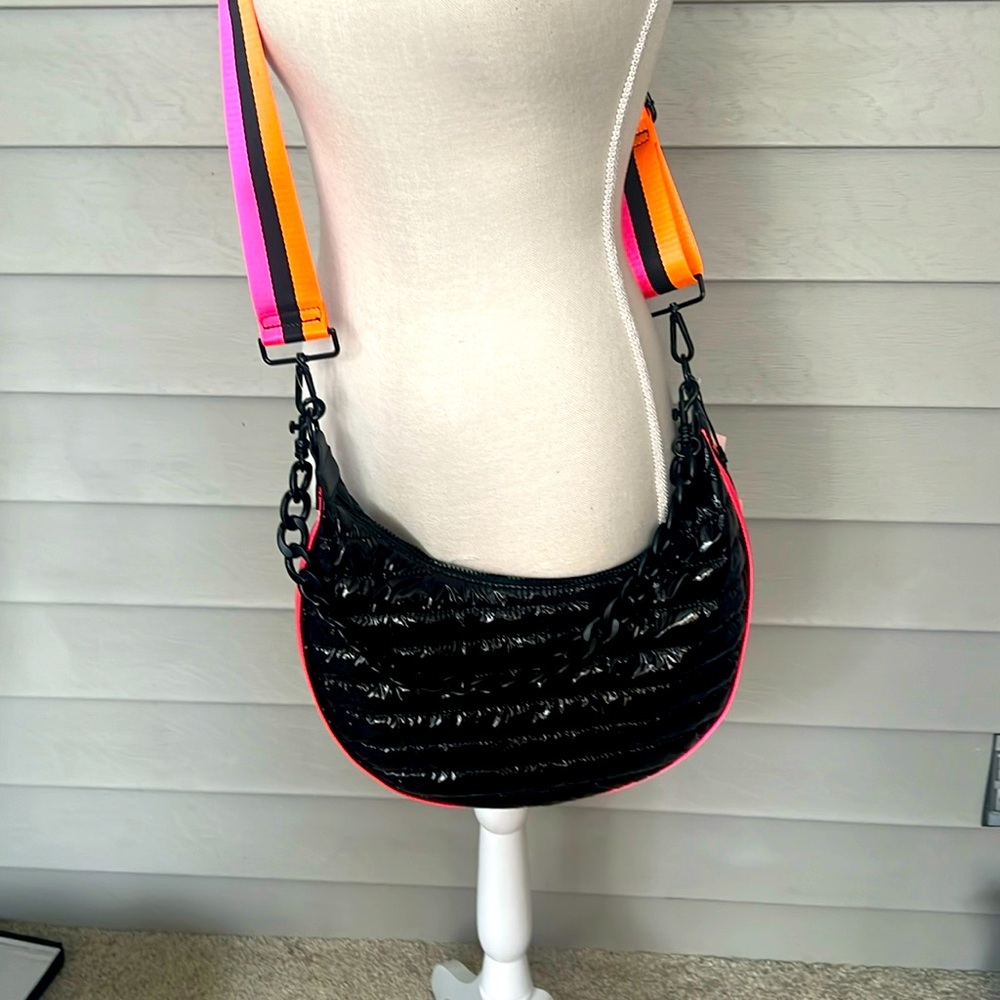 BCBG puffy hobo bag with the guitars trap and a chain